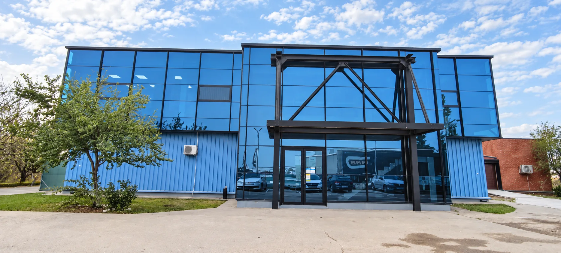 Glass-fronted entrance of the MY SUSHI Pantelimon facility